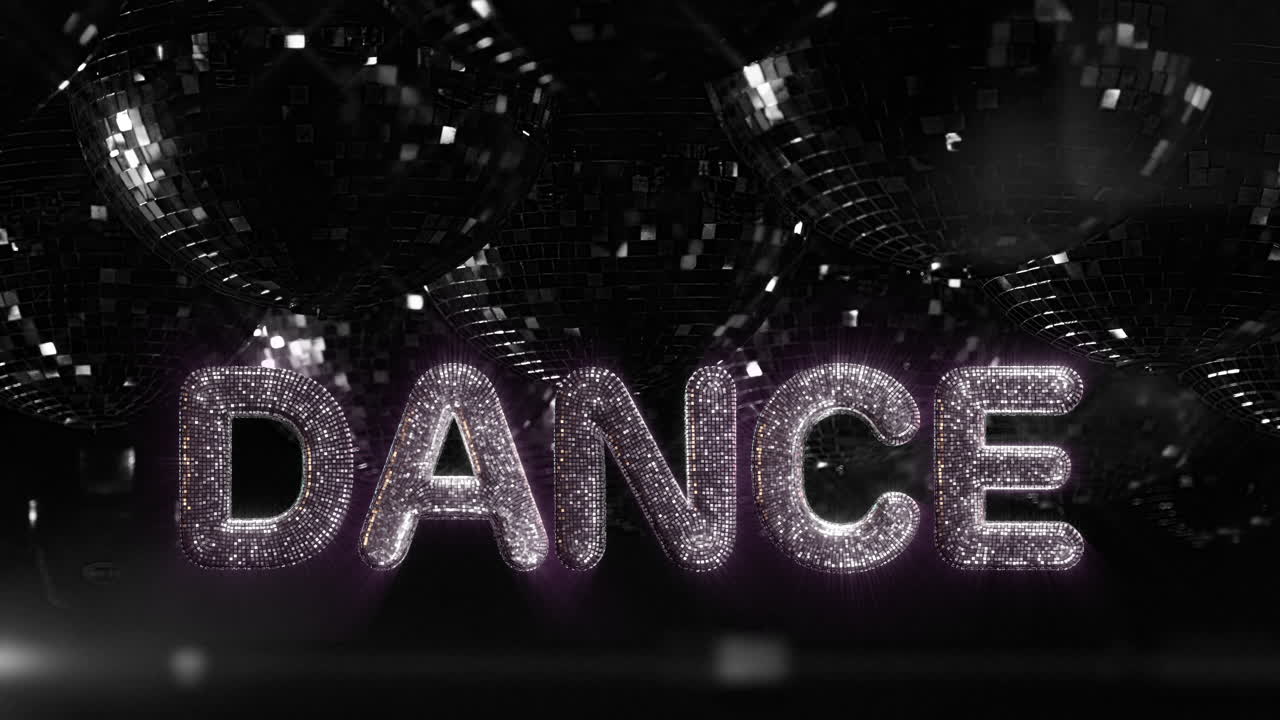 Glitrende ordet DANCE oplyst af spotlights og diskokugler