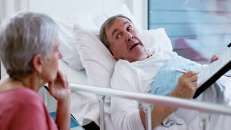 documents, sign and man in bed at hospital