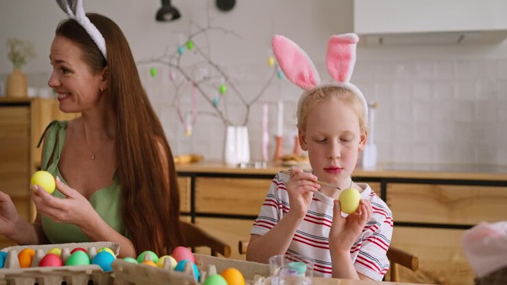 Mother and Daughter Painting Easter Eggs