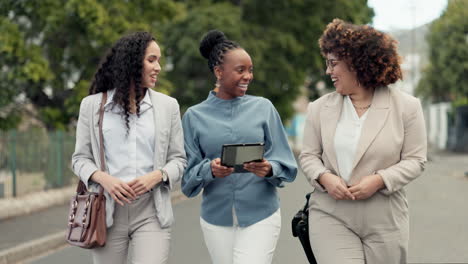 tablet, meeting and business women walking