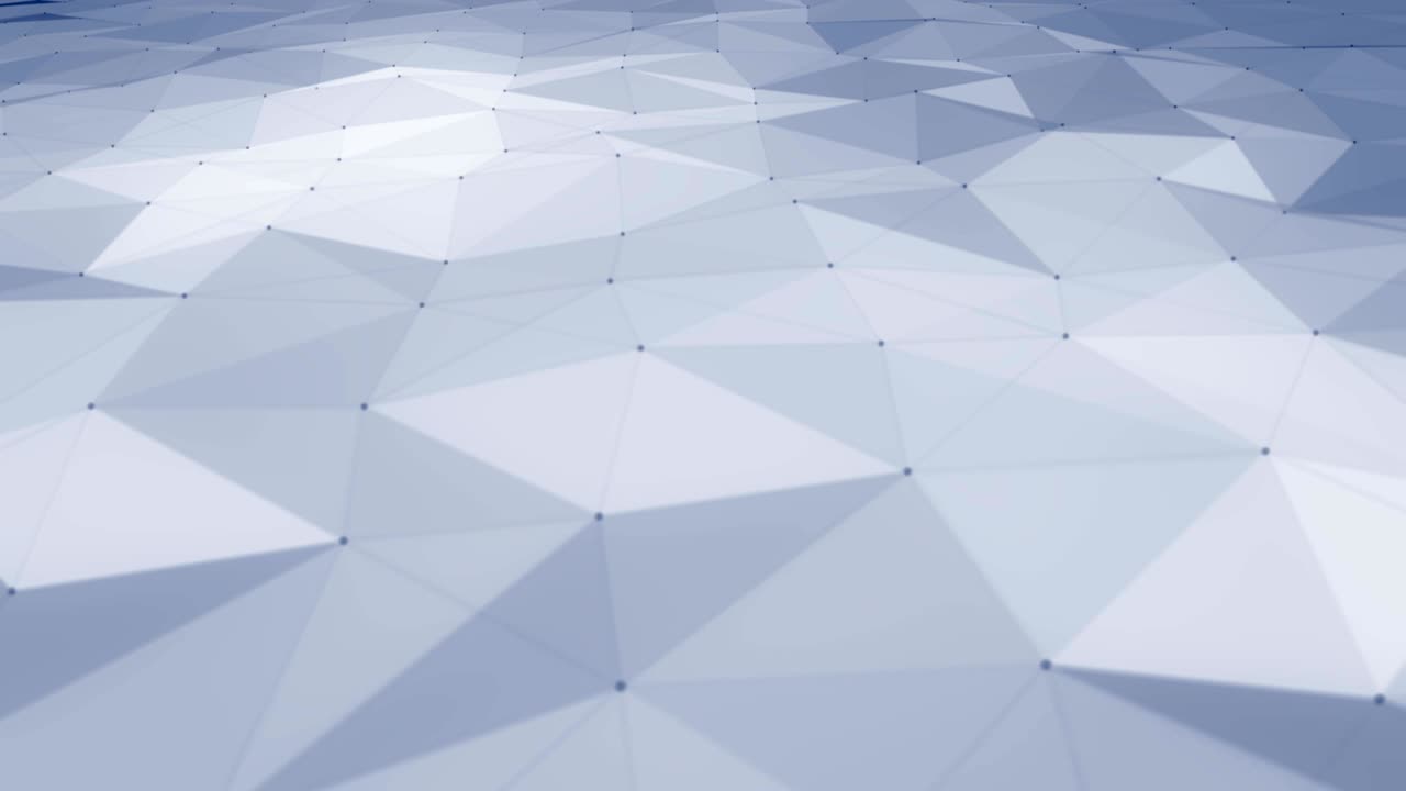 Polygonal abstract mesh slowly undulating.