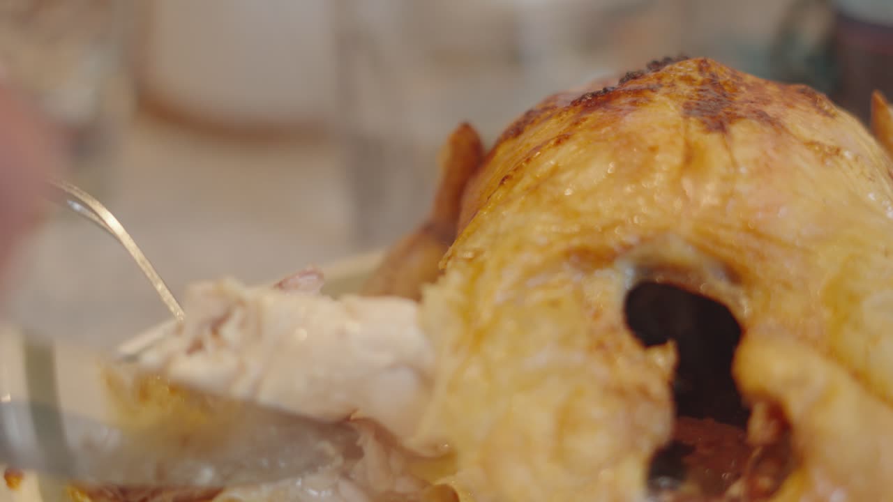 Delicious Steaming Hot Freshly Cooked Juicy Roast Chicken Carved and Plated with Crispy Skin Drumsticks.