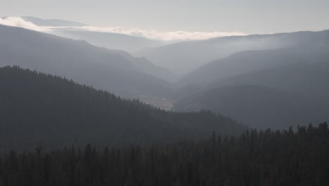 Whispers-of-Wilderness:-A-Breathtaking-Drone-Journey-Over-Clinton,-Silhouettes-in-the-Sky