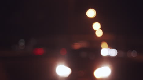 traffic at night on the highway in the big city - blurred atmosphere