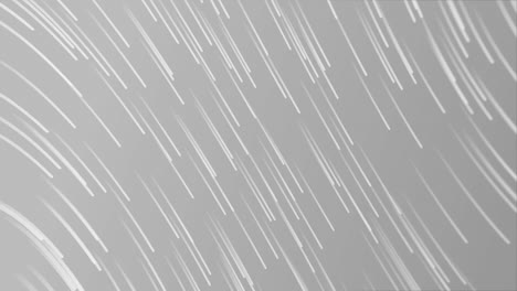 animation of glowing lights trail against grey background