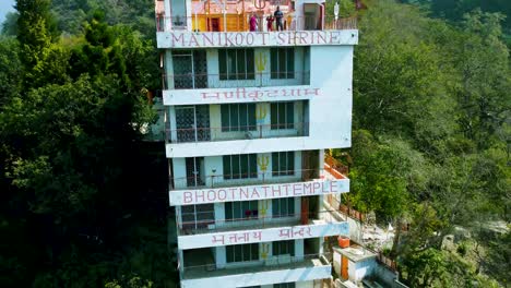 isolate multistory hindu temple in the middle of the forests from different angle aerial shot video is taken at bhutnath temple rishikesh uttrakhand india on mar 15 2022