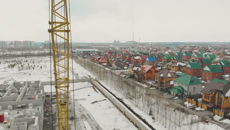 cottage complex multicolored rooftops against grey sky