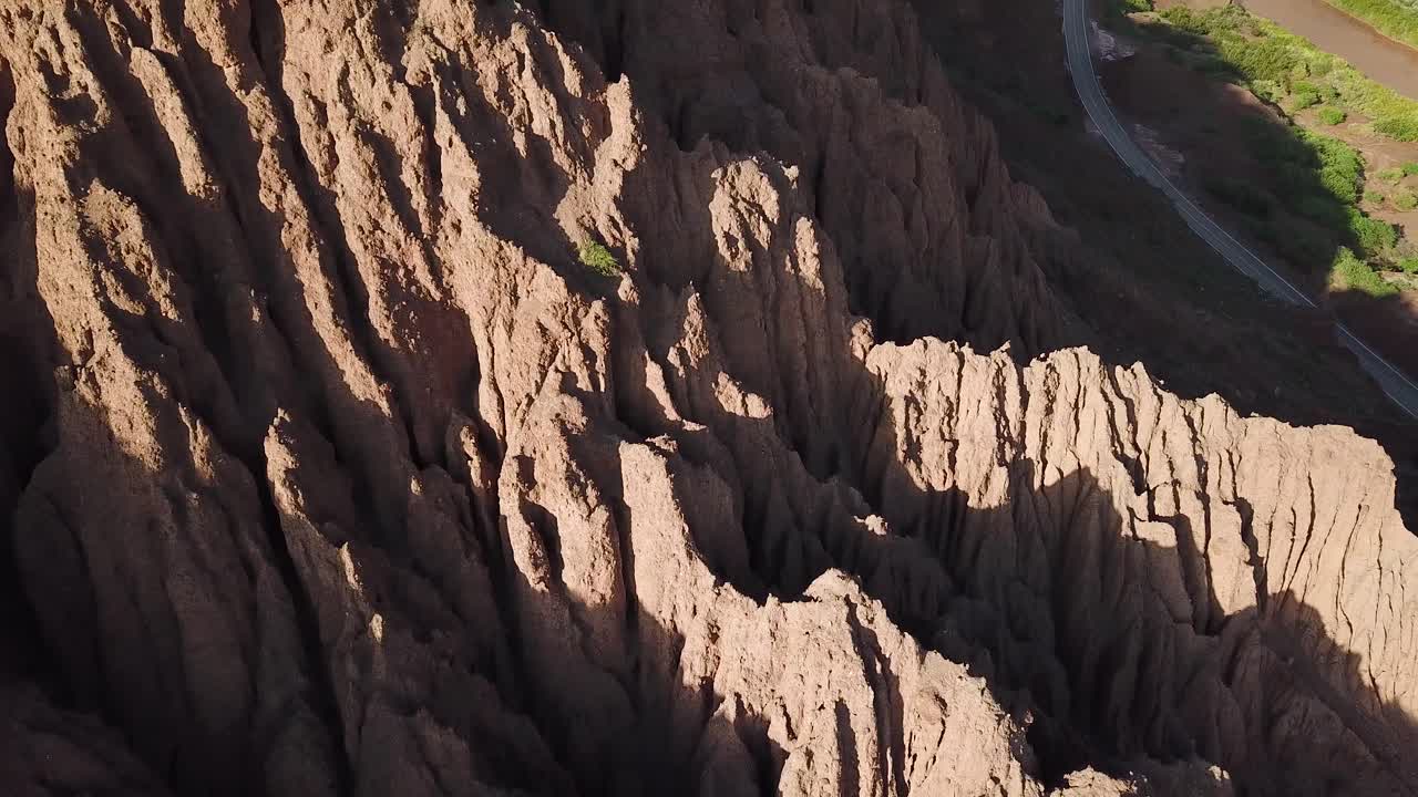 Eroded Sandstone Hills in Calchaqui Valley, Argentina. Drone Aerial View, Pull Back