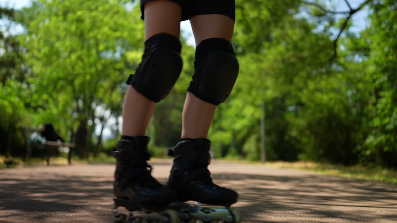 Woman rollerblading in a park
