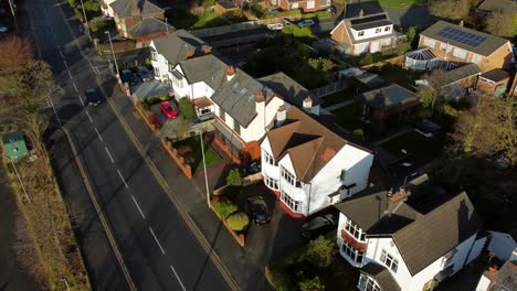 aerial view expensive british middle class houses in rural suburban farnworth village neighbourhood