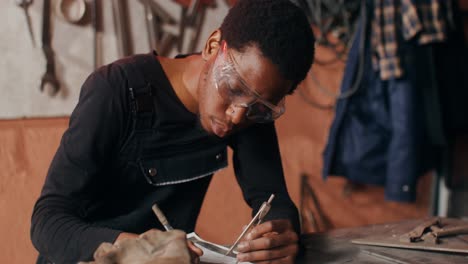 blacksmith at work in a workshop