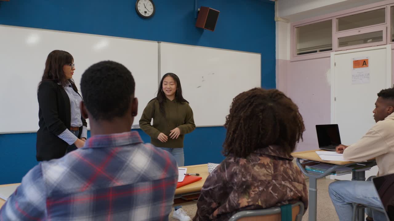 Students in a classroom during a presentation