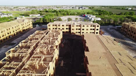 aerial shot of construction progress near freeway