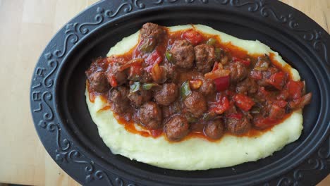 delicious meatballs with mashed potatoes and tomato sauce