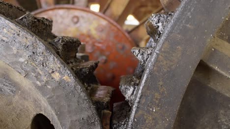 close up shot slow motion of a water mil and gears