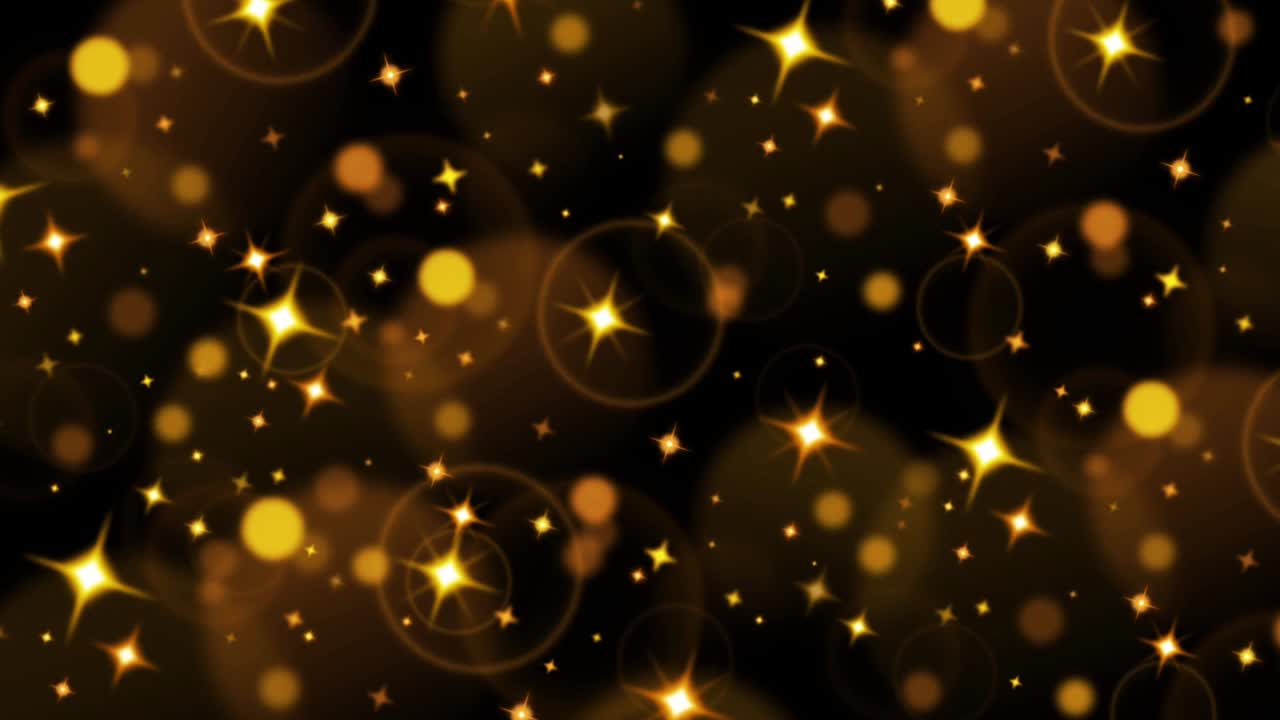 Animation orange light sparkles isolate on black background.