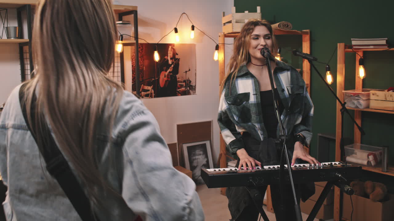 Energetic Girls Playing Rock Music In Studio