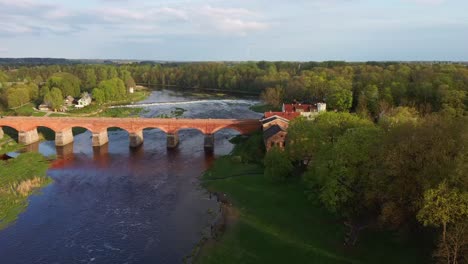 long old brick bridge, kuldiga, latvia across the venta river