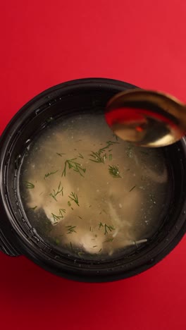 chicken noodle soup in a disposable container