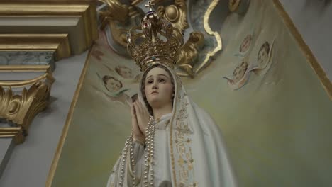 Statue of Virgin Mary with crown and angels