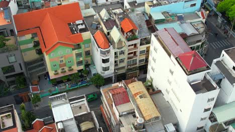 aerial drone circling a residential alley in district one of ho chi minh city vietnam on a sunny afternoon