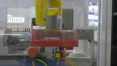 industrial robot arm in manufacturing process