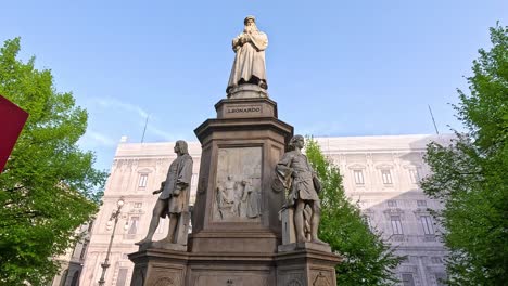 statues and greenery in a public garden