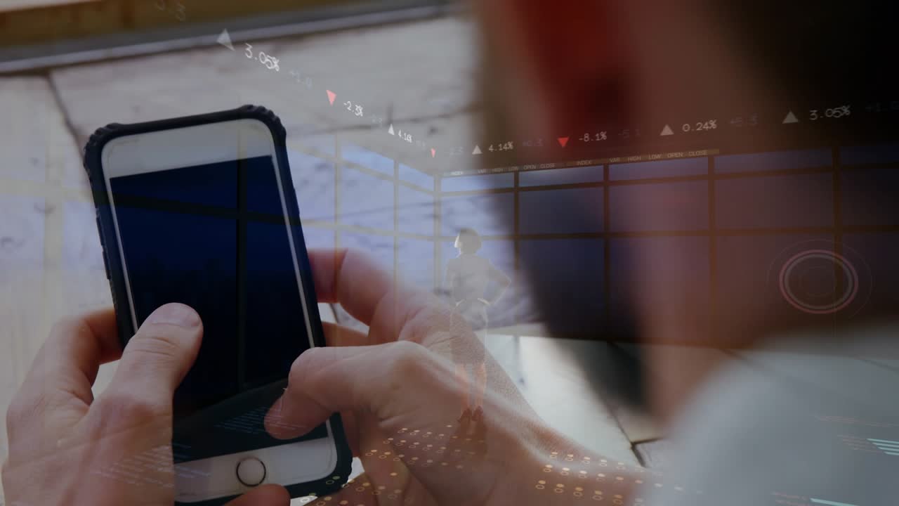 Male analyst tapping phone in office, HUD animating charts merging phone with desk for finance