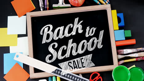 animation of back to school sale text over school items
