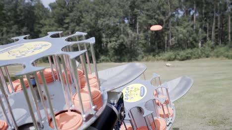 skeet shooter launching clay targets to be shot