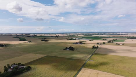 picturesque rural houses and fields at simrishamn town in osterlen, skane province, sweden