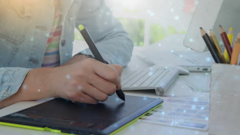 animation of network of connections over man using graphic tablet