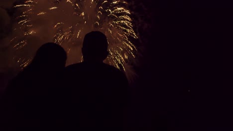 couple watching fireworks