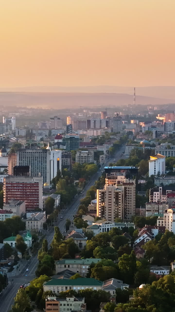 Aerial drone view of Chisinau, Moldova at sunrise. Vertical