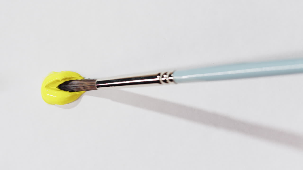 Paint and paintbrush