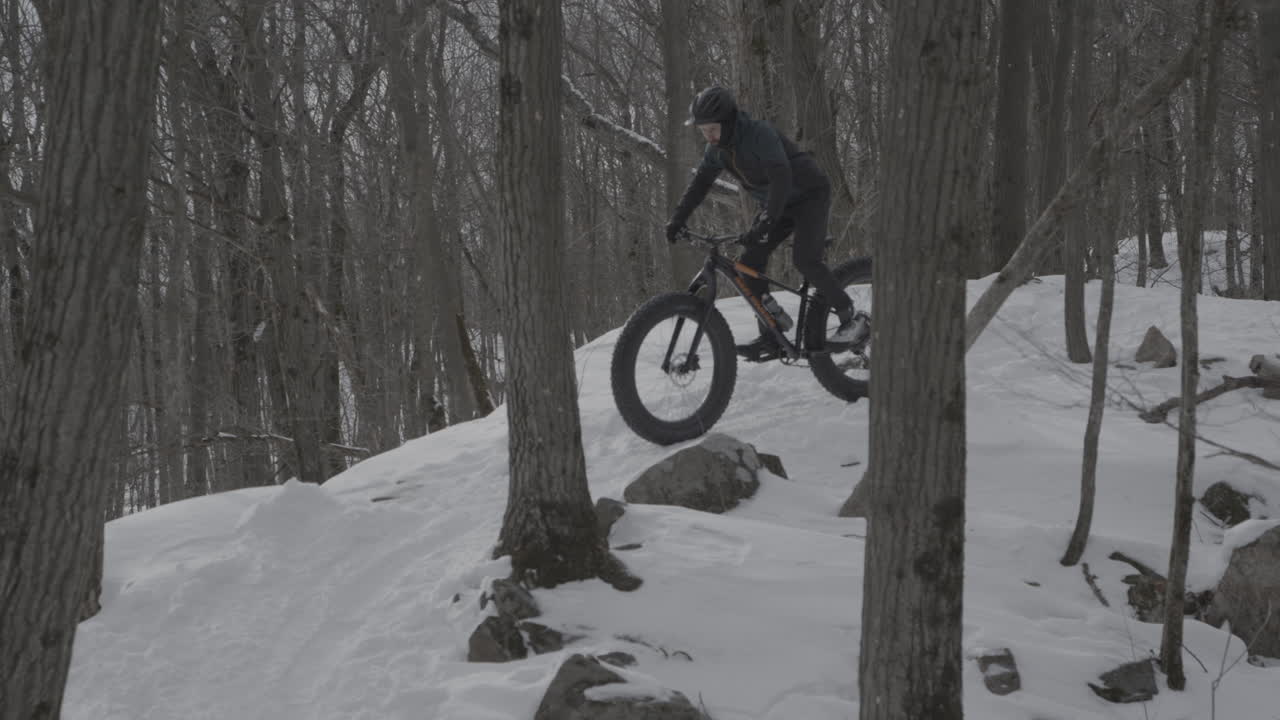 Cyclist on a downhill run with fatbike