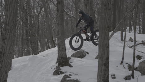 cyclist on a downhill run with fatbike