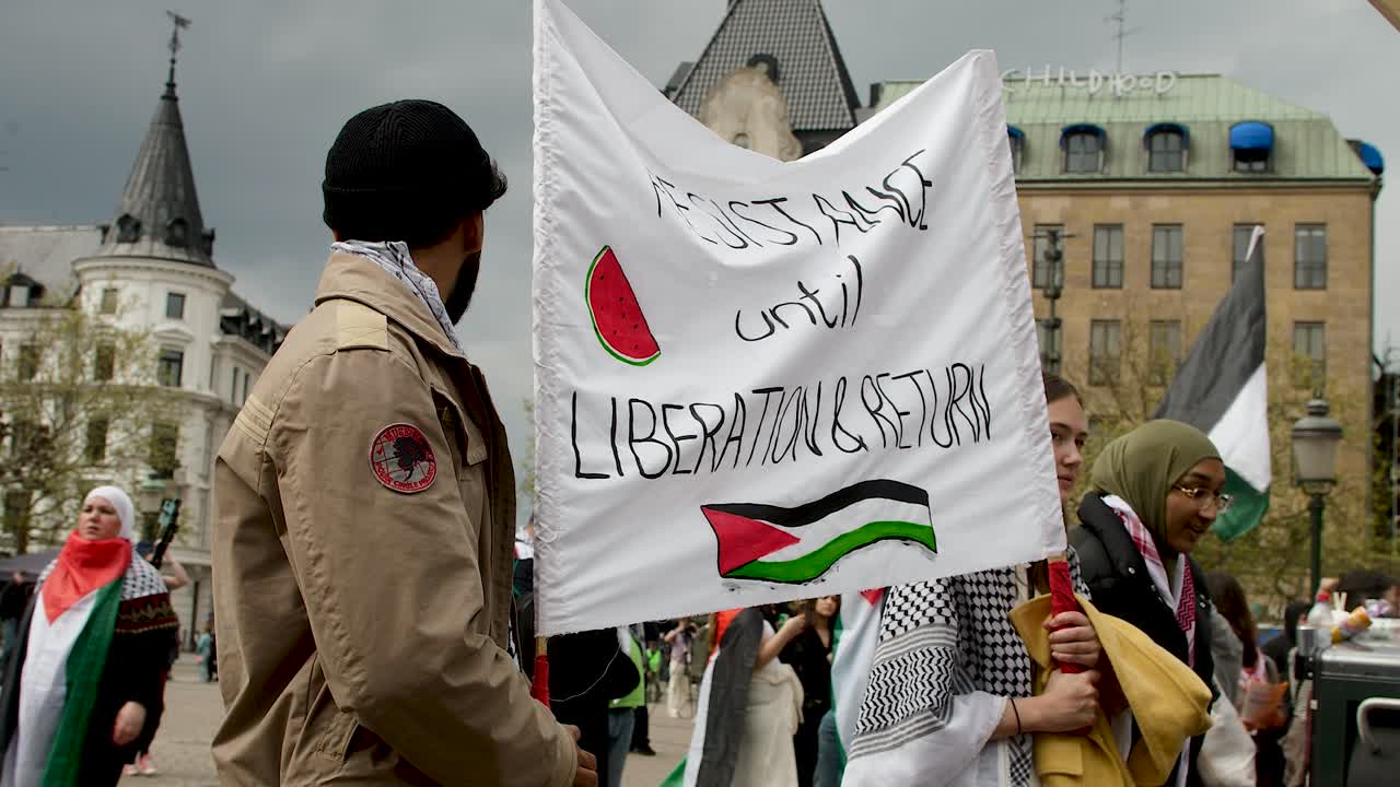 Pro Palestine protesters march against Israel’s Eurovision participation in Malmö (Sweden), calling for a ceasefire on the war in Gaza, Eurovision song contest 2024, medium handheld shot