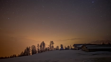 dramatic night scene of flying stars,comet and meteor on dark sky in mountain landscape,time lapse - beautiful milky way galaxy during dusty day on mountaintop in winter