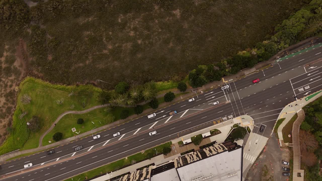 Top aerial view over the highway in the Takapuna districk of Auckland city, New Zealand