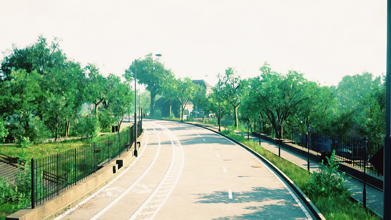 Winding pathway through a tranquil green park under bright sunlight