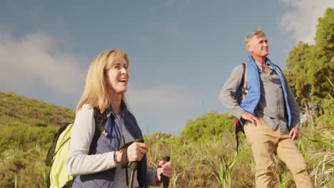 Active-senior-couple-hiking-in-forest