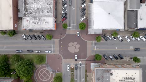 Overhead-view-of-tiger-paw-print-on-intersection-in-Auburn,-Alabama-with-drone-video-stable