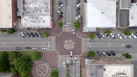 overhead view of tiger paw print on intersection in auburn, alabama with drone video stable