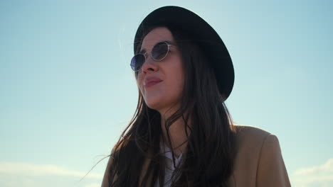 woman outdoors with a smile