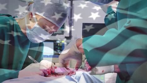 animation of flag of united states of america waving over surgeons in operating theatre