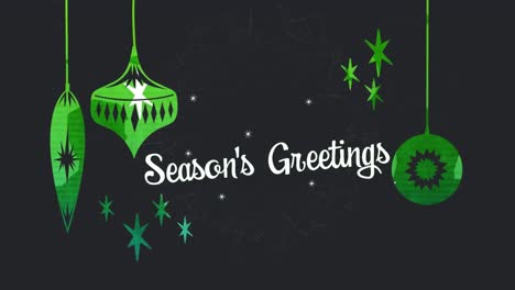 animation of text season's greetings, with white stars and hanging green decorations, on black