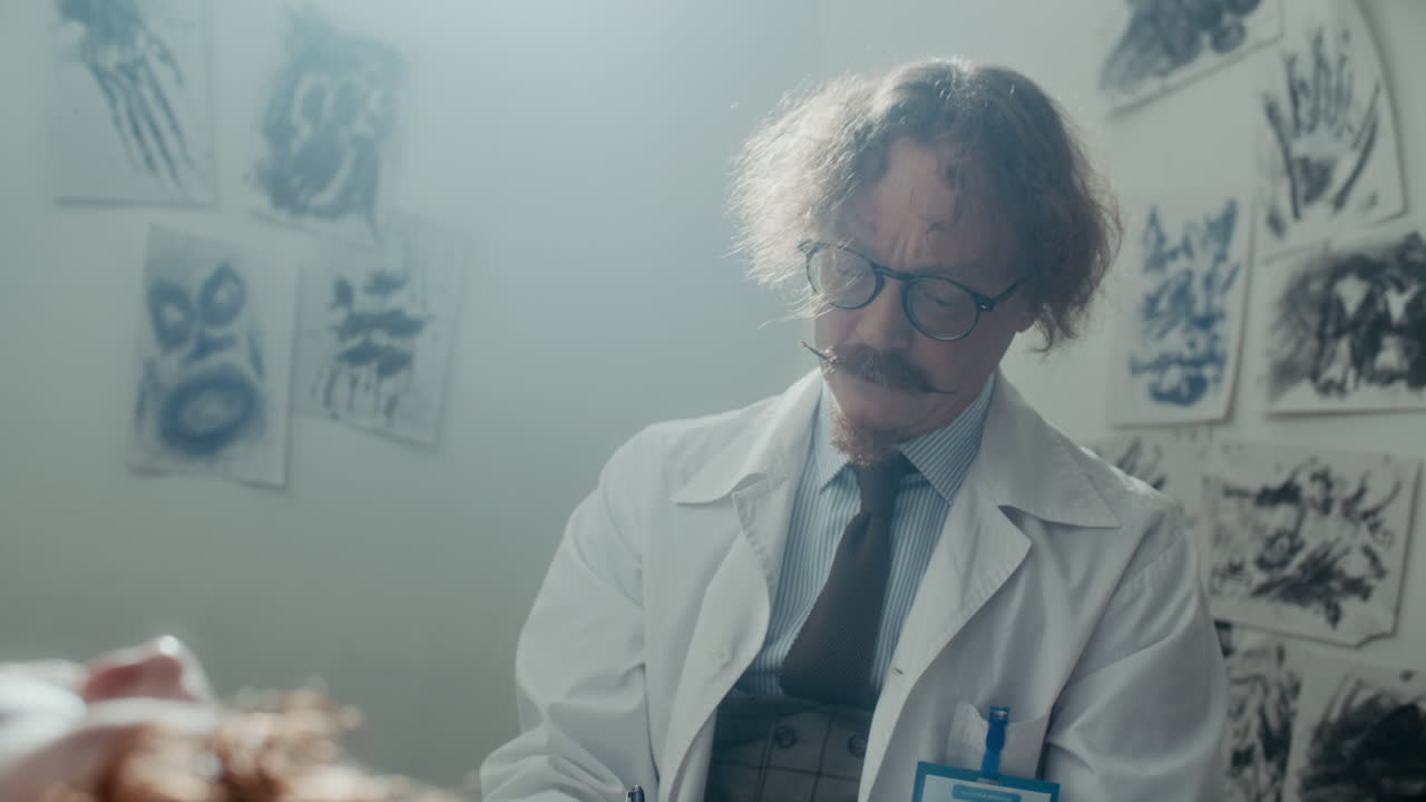 Psychiatrist Performing Light Reflex Test on Patient in Asylum