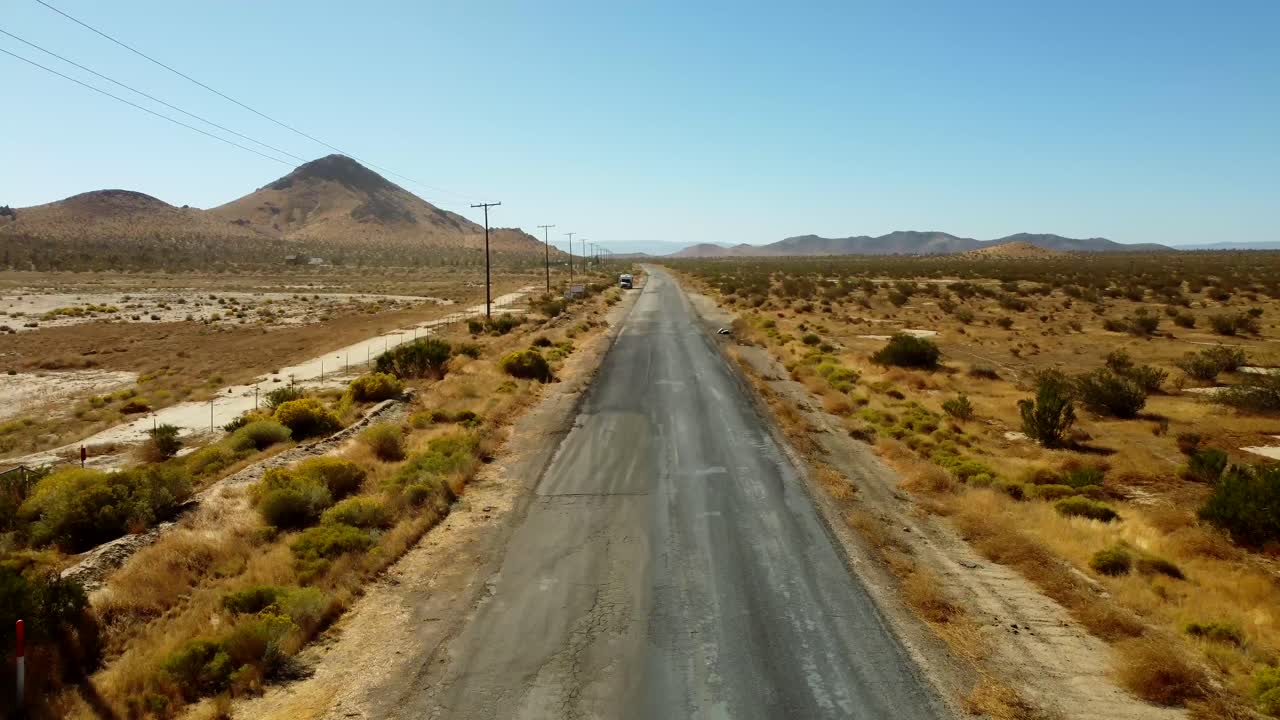USA, CA, Mojave, Golden Queen Mine, 45585 - Drone view of a lonely desolate highway outside of Mojave, CA