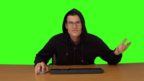 hacker typing at his desk